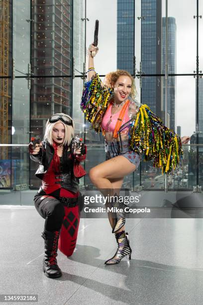 Cosplayers dressed as Harley Quinn during Day 4 of New York Comic Con 2021 at Jacob Javits Center on October 10, 2021 in New York City.