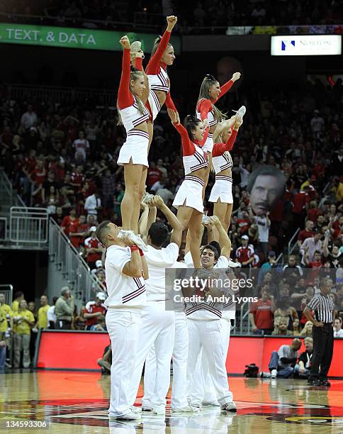 Louisville Cardinals cheerleaders perform during the game the against Vanderbilt Commodores at KFC YUM! Center on December 2, 2011 in Louisville,...