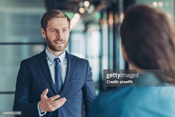 business leader - meeting candid office suit stock pictures, royalty-free photos & images