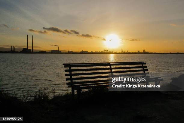 dollymount strand sunset - dollymount strand dublin stock pictures, royalty-free photos & images