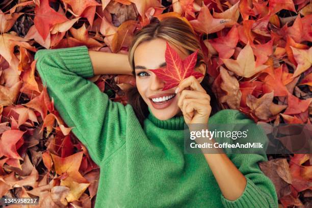 enjoying autumn - beautiful woman autumn stock pictures, royalty-free photos & images