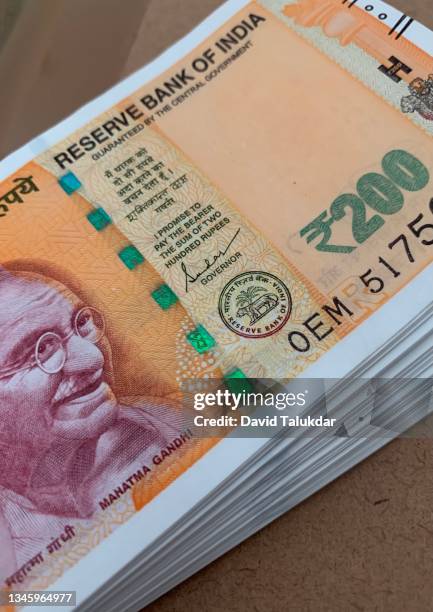 indian 200 note currency - bundle stock pictures, royalty-free photos & images