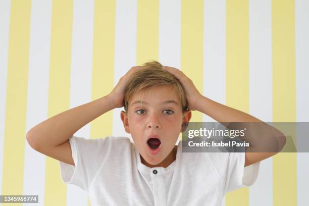portrait of surprised boy - head imagens e fotografias de stock