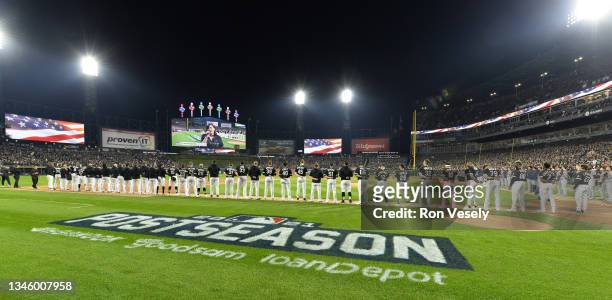 The Chicago White Sox line up for the National Anthem prior to Game Three of the American League Division Series against the Houston Astros on...