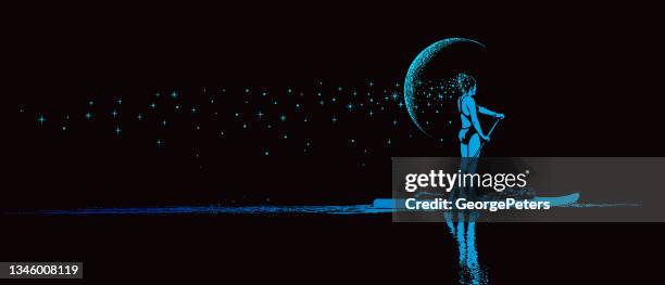 woman paddleboarding by moonlight - paddleboarding stock illustrations