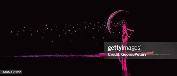 woman paddleboarding by moonlight - paddle board stock illustrations