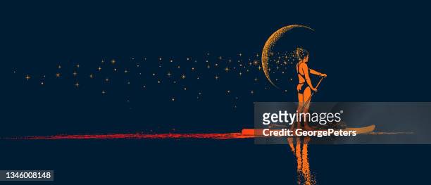woman paddleboarding by moonlight - paddleboarding stock illustrations