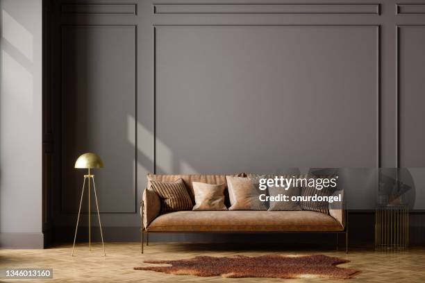 home interior with brown leather sofa, empty wall and floor lamp - vardagsrum bildbanksfoton och bilder