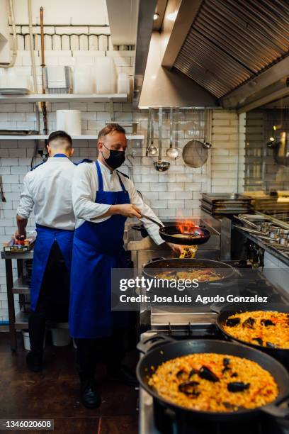 Cooking Vertically 494 Vertical Chef Cooking Motion Stock Photos, High-Res Pictures, and ...
