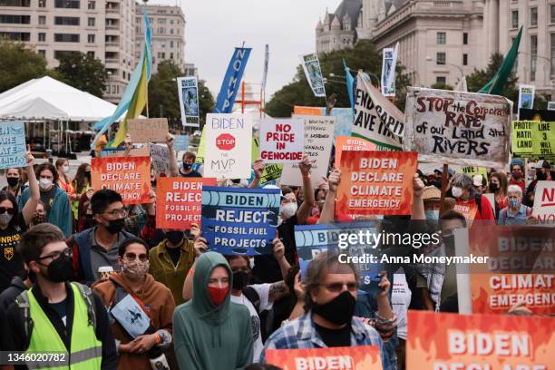 Demonstrators march in honor of Indigenous Peoples’ Day at Freedom Plaza on October 11, 2021 in Washington, DC. Activists organized the march to the...