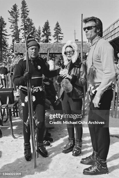 American actress Natalie Wood with her husband Richard Gregson and actor Clint Eastwood at a Benson & Hedges celebrity ski race in Bear Valley,...