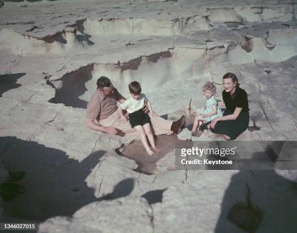 Lord Louis Mountbatten and Lady Edwina Mountbatten playing with Prince Charles and Princess Anne on Malta, 24th April 1954.
