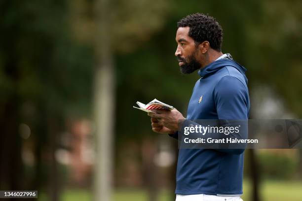 Smith of the North Carolina A&T Aggies checks his course book during the Phoenix Invitational at Alamance Country Club on October 11, 2021 in...