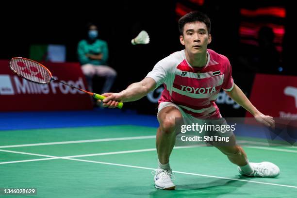 Kantaphon Wangcharoen of Thailand competes in the Men's Single match against Anthony Sinisuka Ginting of Indonesia during day three of the Thomas &...