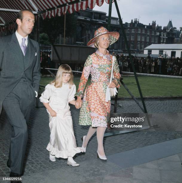The Duke and Duchess of Kent with their daughter Lady Helen Windsor at a wedding, UK, circa 1972.