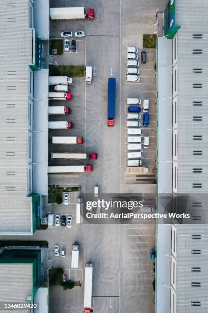 aerial view of the logistics and distribution center - warehouse exterior stock pictures, royalty-free photos & images