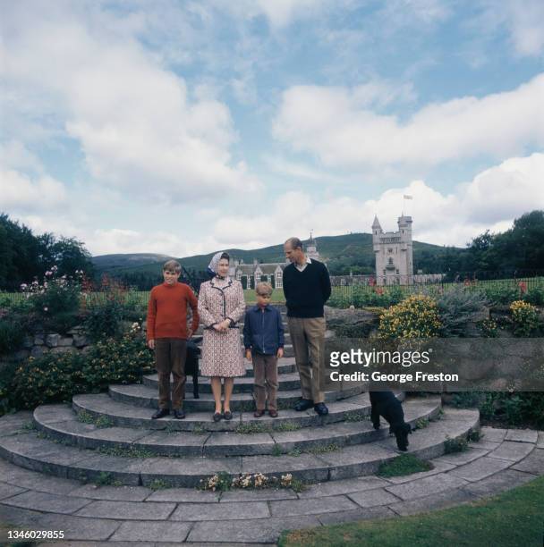 Queen Elizabeth II and Prince Philip, the Duke of Edinburgh with their sons Prince Andrew and Prince Edward at Balmoral Castle in Scotland, on their...