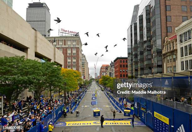 Benson Kipruto of Kenya reacts as he crosses the finish line to win the 125th Boston Marathon on October 11, 2021 in Boston, Massachusetts.