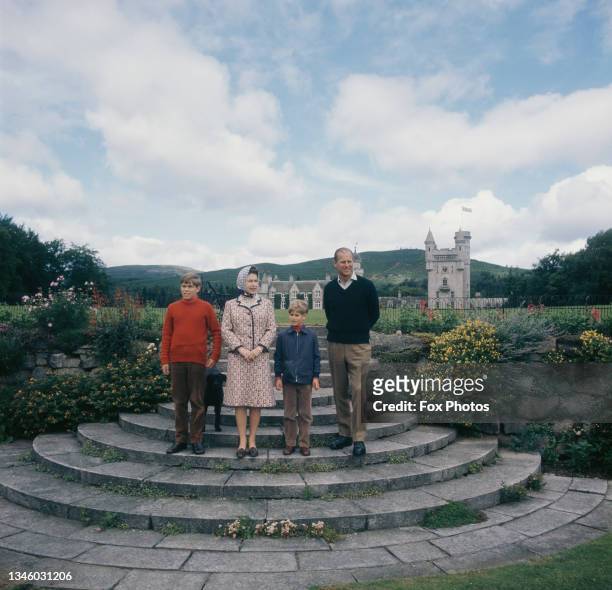 Queen Elizabeth II and Prince Philip, the Duke of Edinburgh with their sons Prince Andrew and Prince Edward at Balmoral Castle in Scotland, on their...