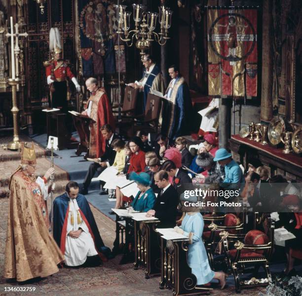 Michael Ramsey, the Archbishop of Canterbury gives the blessing to Queen Elizabeth II, Prince Philip, the Duke of Edinburgh and the Queen Mother...