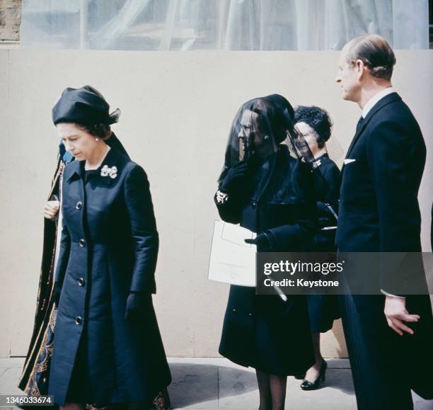 Queen Elizabeth II, Prince Philip, the Duke of Edinburgh and Wallis, Duchess of Windsor leave St George's Chapel, Windsor, after the funeral service...