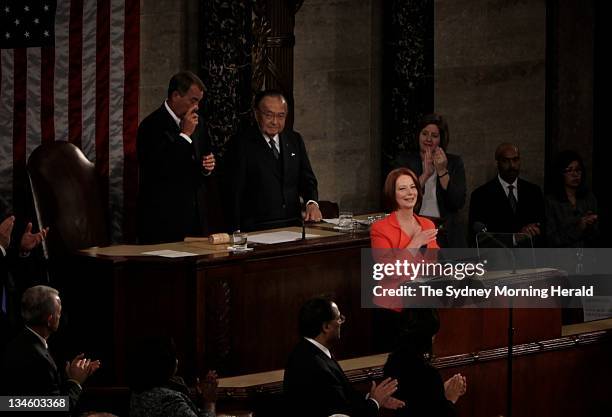 Speaker of the House John Boehner wipes a tear from his eye as Prime Minister Julia Gillard places her hand on her heart during a standing ovation...