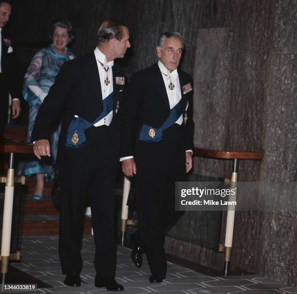 Prince Philip, Duke of Edinburgh and his uncle Louis Mountbatten, 1st Earl Mountbatten of Burma at the Royal Festival Hall in London, UK, 19th May...
