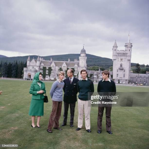 Queen Elizabeth II with Prince Philip, the Duke of Edinburgh and their sons Prince Edward , Prince Charles and Prince Andrew in the grounds of...