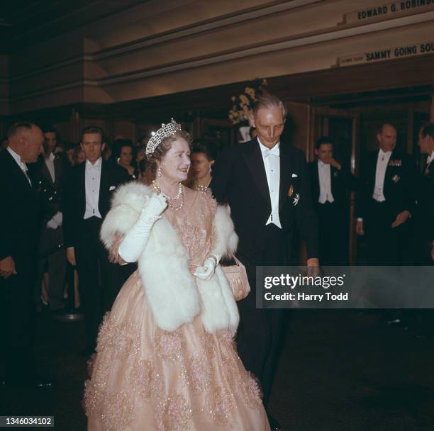 The Queen Mother attends the 17th Royal Film Performance at the Odeon Leicester Square in London, with Sir Philip Warter, President of the Cinema and...
