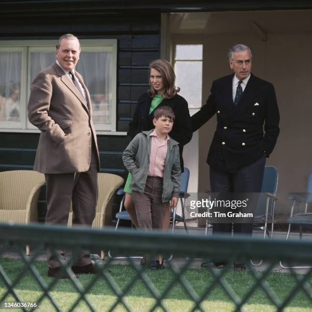 Princess Anne and Prince Andrew with Louis Mountbatten, 1st Earl Mountbatten of Burma during a polo match at Smith's Lawn in Windsor, UK, 28th April...