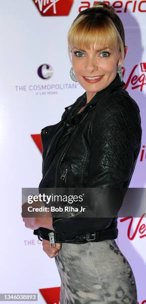 Actress Jaime Pressly pose for photographers on the red carpet at event, April 22 in Las Vegas, Nevada.