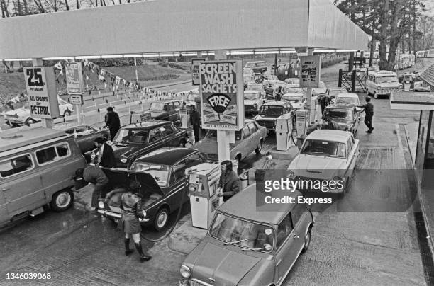 Cars queuing at a petrol station in the UK, during a fuel shortage, 5th May 1973.