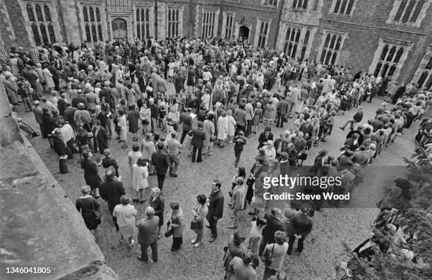 People queuing in the courtyard of Sutton Place in Surrey, UK, 20th May 1973. The Tudor manor house, home of industrialist J. Paul Getty, is open to...