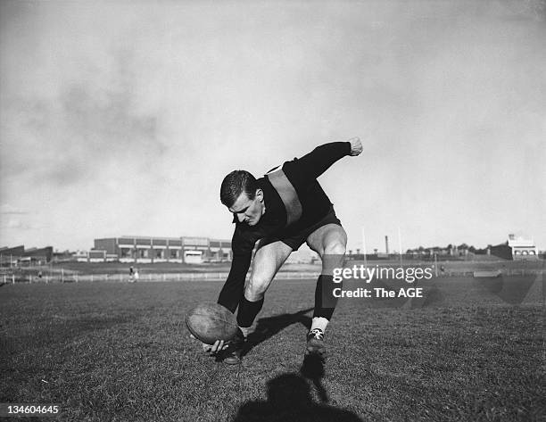 Grand Final 1958. Collingwood VS Melbourne. Barry Harrison scoops up the ball at training, 16 September 1958.