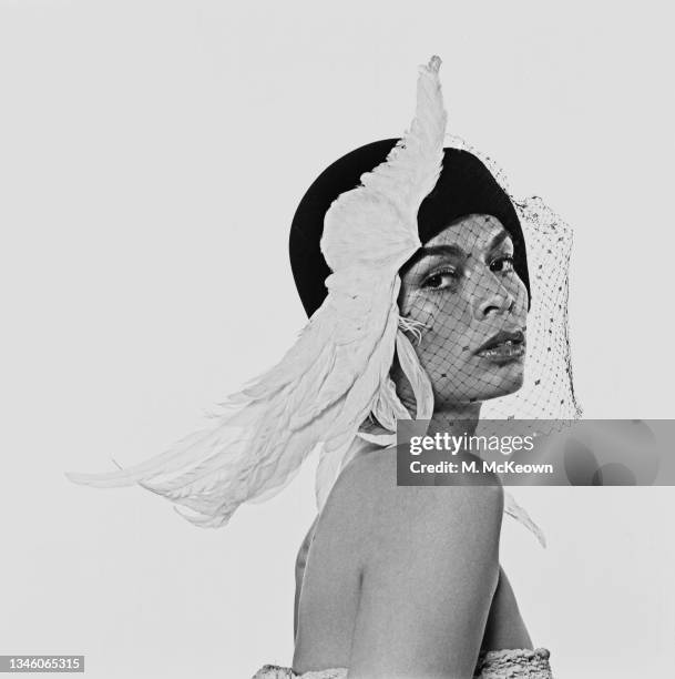 Nicaraguan actress Bianca Jagger, the wife of singer Mick Jagger of the Rolling Stones, wearing a hat with a feathered ornament, UK, 7th October 1973.