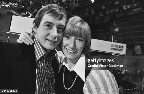 English actor Derek Fowlds and BBC 'Blue Peter' presenter Lesley Judd after the announcement of their engagement, London, UK, 6th December 1973.
