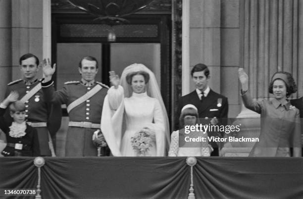 Princess Anne and Mark Phillips on the balcony of Buckingham Palace in London after their wedding, UK, 14th November 1973. From left to right, Prince...