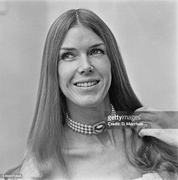 Helen Stewart, the wife of Scottish racing driver Jackie Stewart, wearing a pearl, diamond and ruby choker which was a birthday gift from her...
