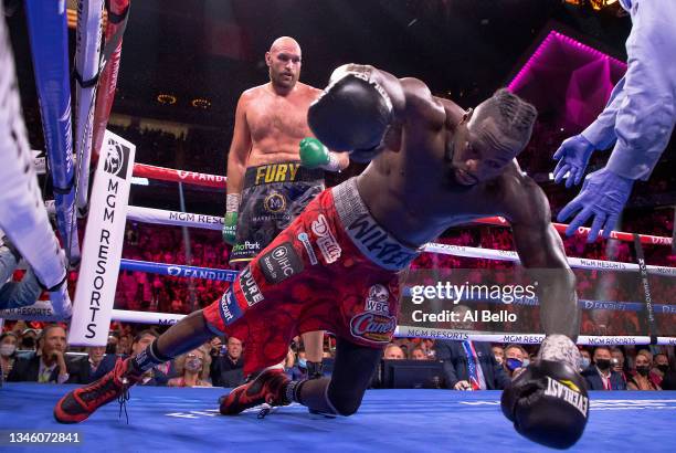 Deontay Wilder is knocked out by Tyson Fury in the 11th round during their WBC heavyweight title fight at T-Mobile Arena on October 09, 2021 in Las...