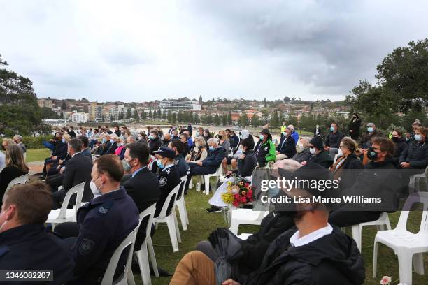 Family and community members attend a ceremony at Coogee marking the 19th anniversary of the 2002 Bali Bombings on October 12, 2021 in Sydney,...