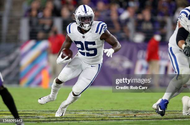 Marlon Mack of the Indianapolis Colts rushes during the second quarter in a game against the Baltimore Ravens at M&T Bank Stadium on October 11, 2021...