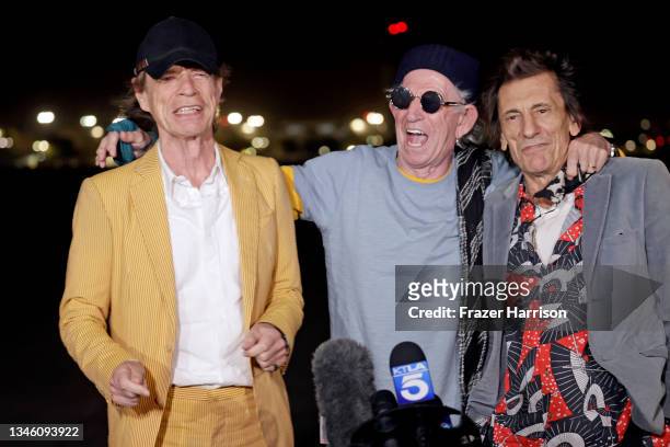 Mick Jagger, Keith Richards, and Ronnie Wood of The Rolling Stones touch down at Hollywood Burbank Airport on October 11, 2021 ahead of their shows...