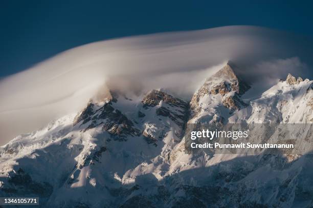 beautiful clouds over nanga parbat mountain massif view from fairy meadow,ninth highest peak in the world ,himalaya mountains range in gilgit baltistan, pakistan - nanga parbat stock pictures, royalty-free photos & images