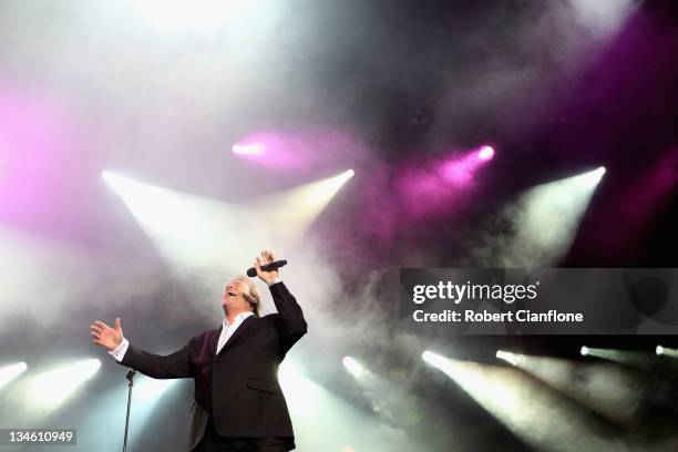 John Farnham performs on stage as part of the Race By Day Rock All Night Concert series at the ANZ Stadium on December 3, 2011 in Sydney, Australia.