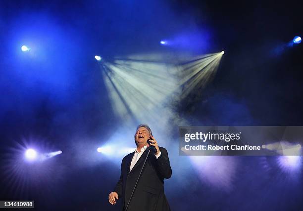 John Farnham performs on stage as part of the Race By Day Rock All Night Concert series at the ANZ Stadium on December 3, 2011 in Sydney, Australia.