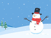 Winter Christmas landscape with snowmen and snowfall