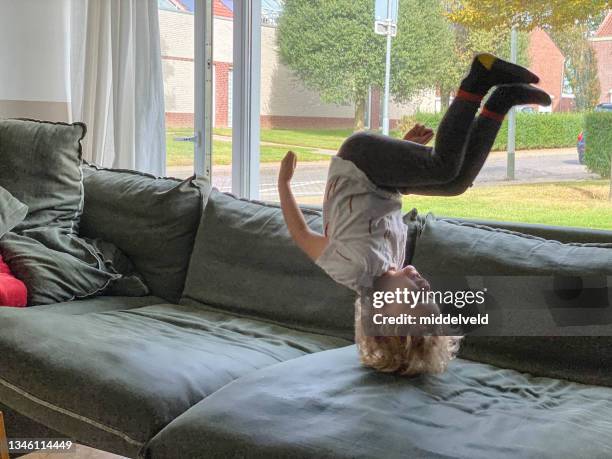 jumping toddler - jumping out of seat stock pictures, royalty-free photos & images