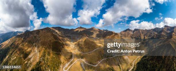 aerial view of the famous transfagarash highway, romania. mountain road and beautiful landscape - alps romania stock pictures, royalty-free photos & images