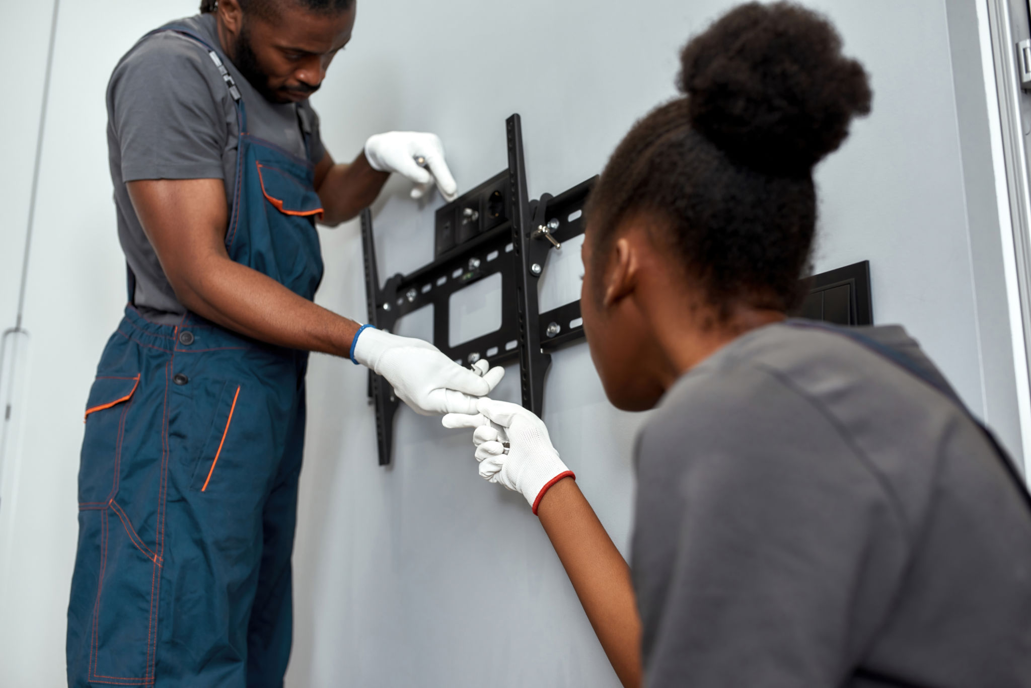 person installing tv