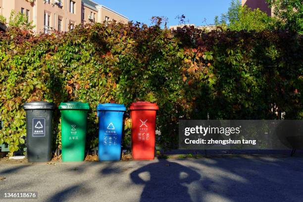 various garbage containers in yard - daily life in dalian stock pictures, royalty-free photos & images